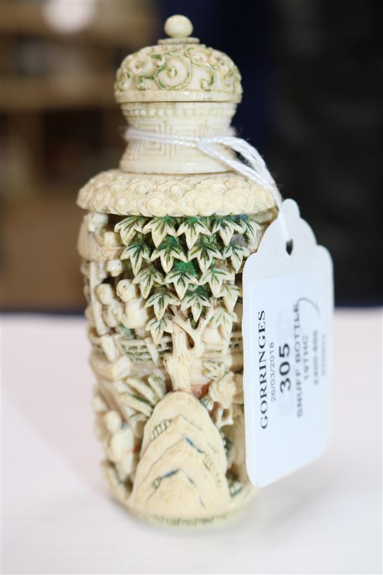 A Chinese coloured ivory snuff bottle 19th century 10cm.